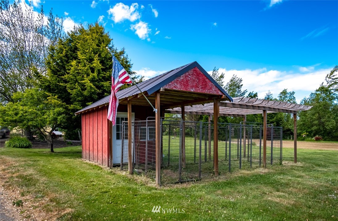 322 O Brien Road Port Angeles, WA 98362 - Photo 7 of 37 a view of a house with a backyard and a tree