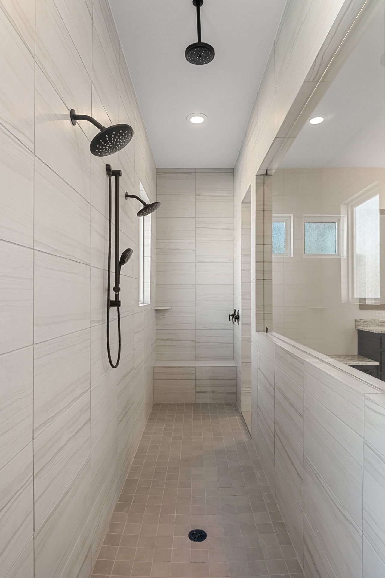 5420 Destination Way Jonestown, TX 78645 - Photo 11 of 39 Spa-like main shower with 4 showerheads and plenty of space!