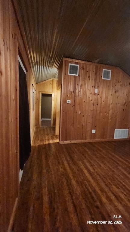 1250 County Road 4120 Bonham, TX 75418 - Photo 20 of 27 a view of an empty room with wooden floor and a window