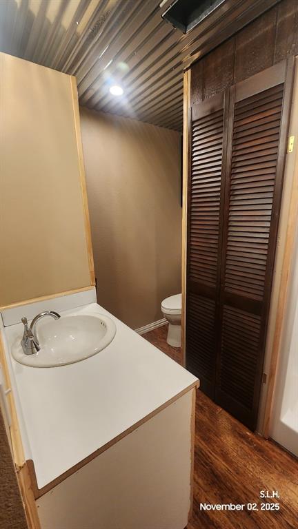 1250 County Road 4120 Bonham, TX 75418 - Photo 25 of 27 a bathroom with a sink and toilet