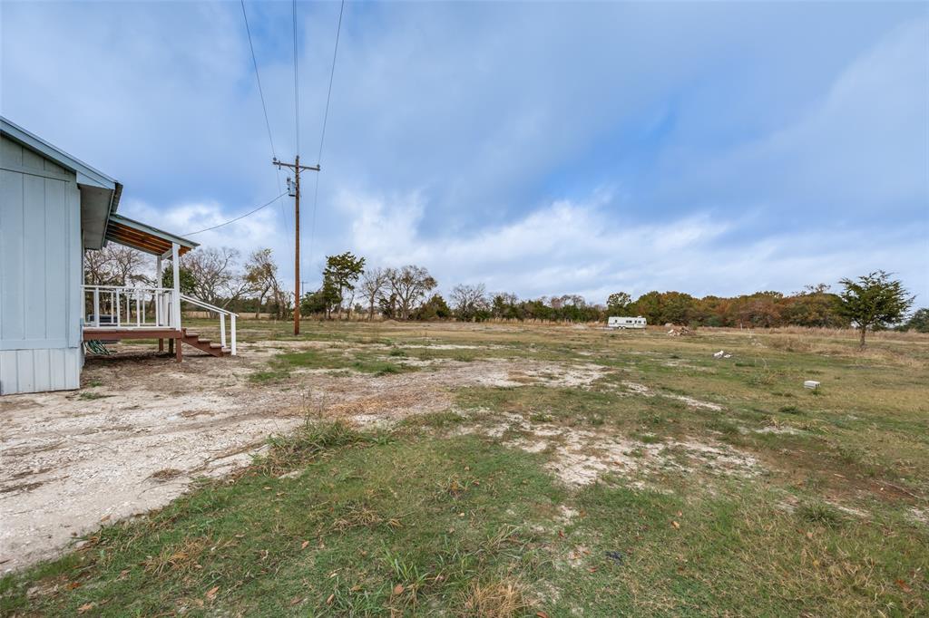 1250 County Road 4120 Bonham, TX 75418 - Photo 7 of 27 a view of an ocean with a nearby beach
