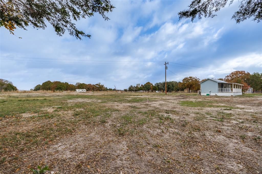 1250 County Road 4120 Bonham, TX 75418 - Photo 9 of 27 a view of lake with mountain in the back