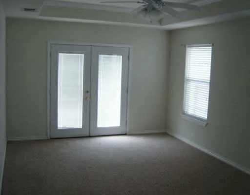 an empty room that has a window