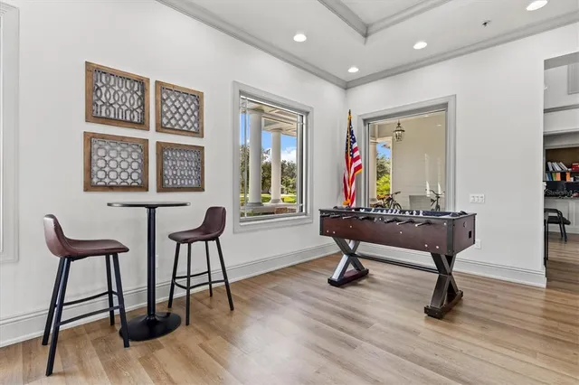 a view of a lake with houses in the back