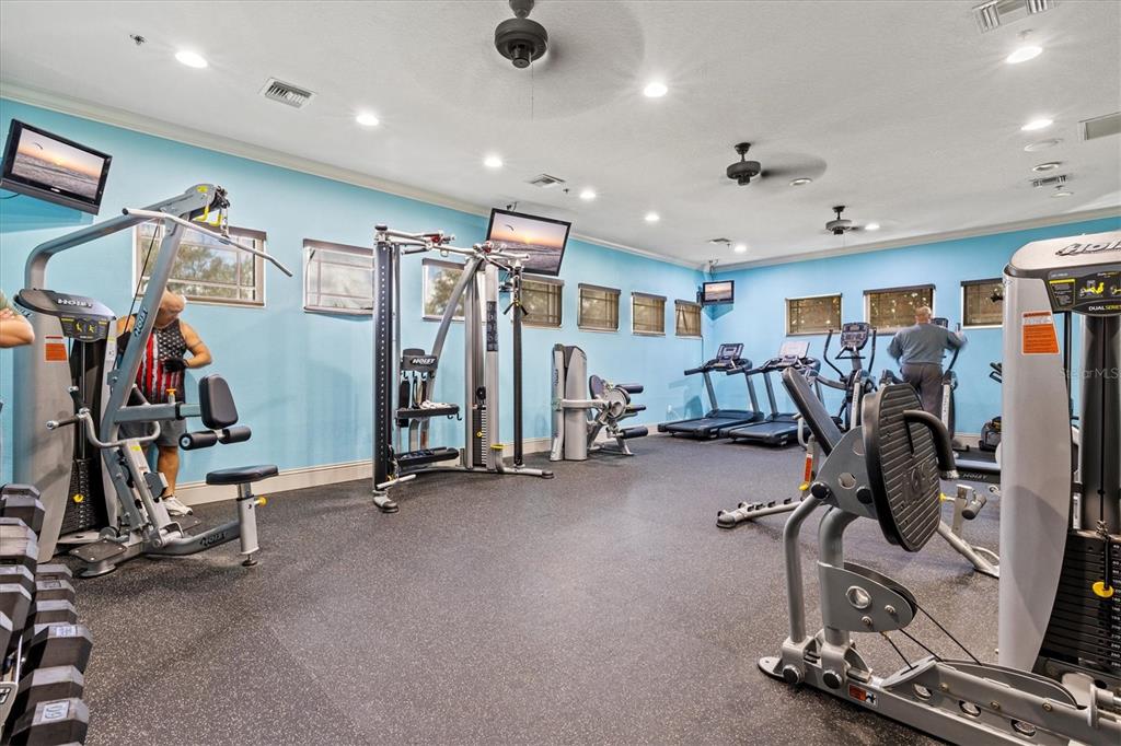 7923 111th Terrace East Parrish, FL 34219 - Photo 54 of 80 a view of a room with gym equipment