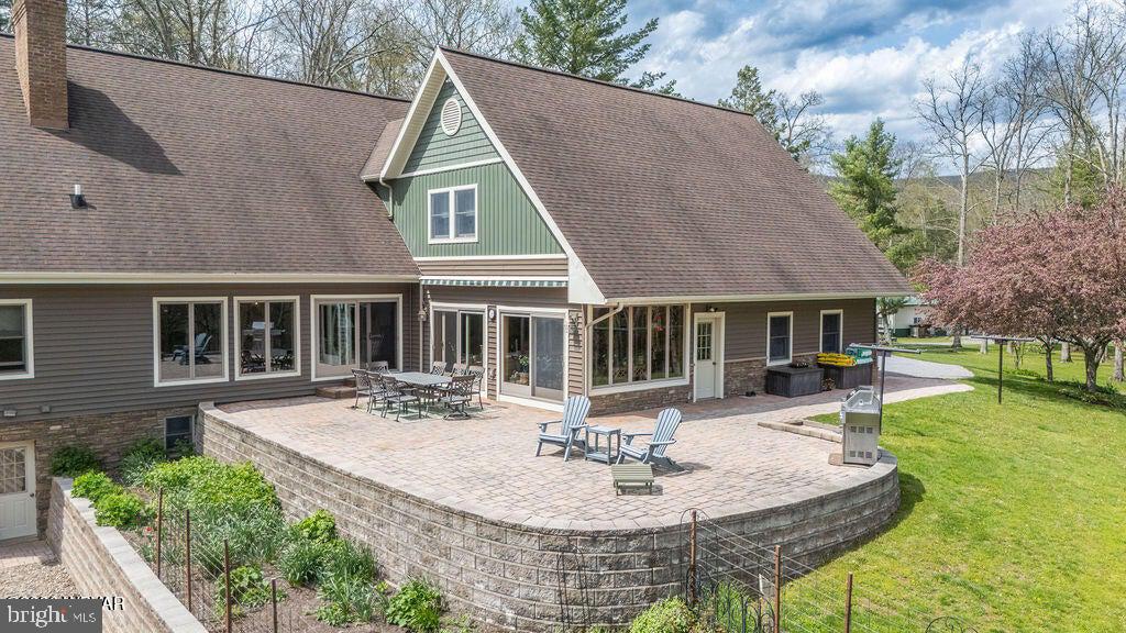 2270 Pine Tree Road Hughesville, PA 17737 - Photo 7 of 90 Charming home with inviting patio space.