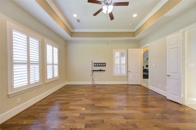 a spacious bathroom with a granite countertop tub sink and mirror