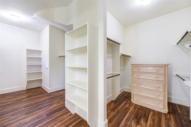 a view of room window and wooden floor