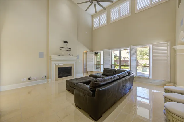 a kitchen with stainless steel appliances kitchen island granite countertop a sink and cabinets
