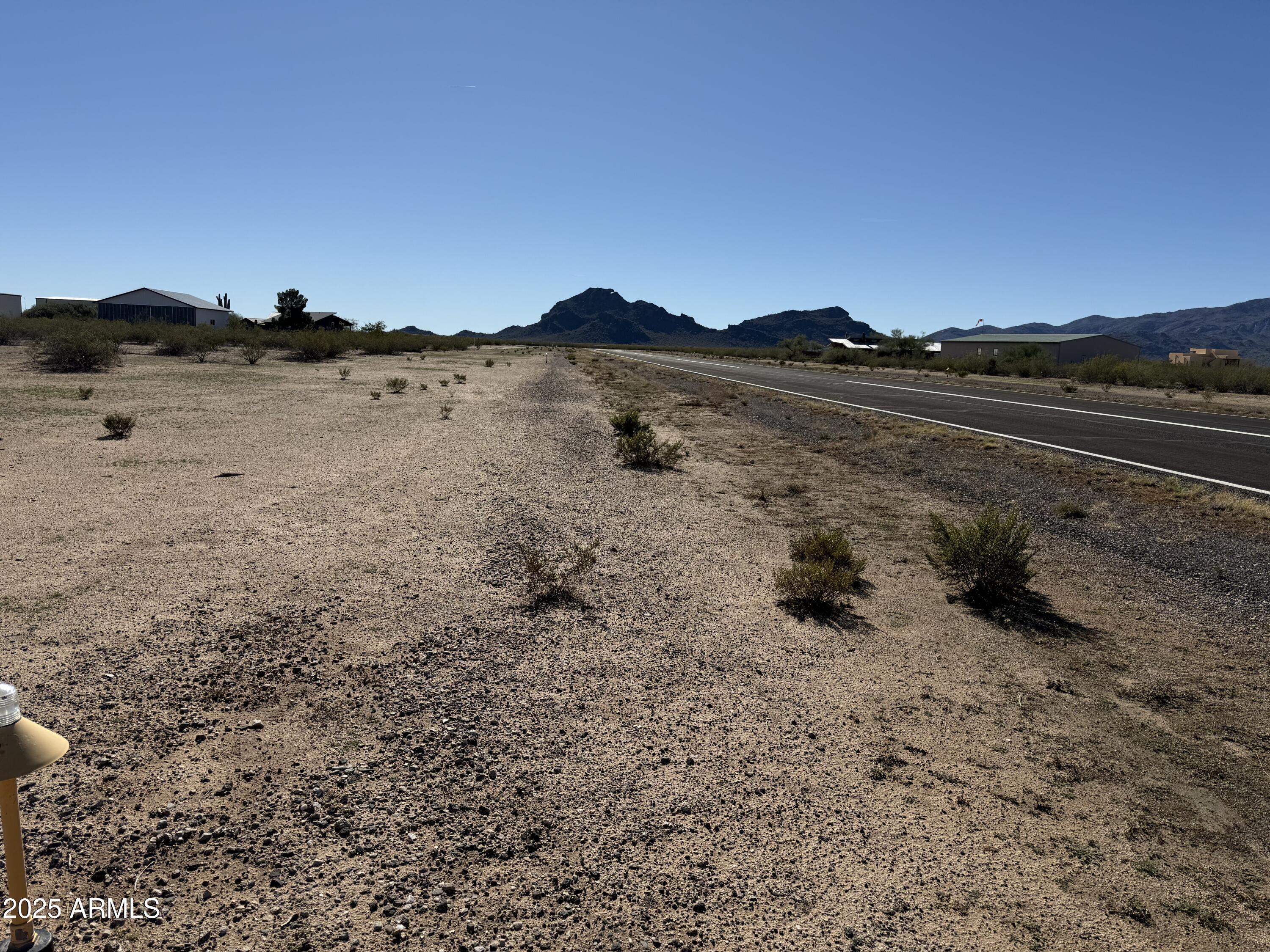0 West William Road, Unit B Aguila, AZ 85320 - Photo 8 of 15 a view of a lake with mountain in the background