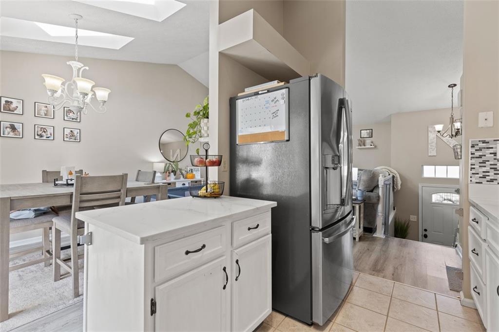 5079 Windriver Drive McKees Rocks, PA 15136 - Photo 12 of 50 a kitchen with stainless steel appliances a refrigerator and a stove