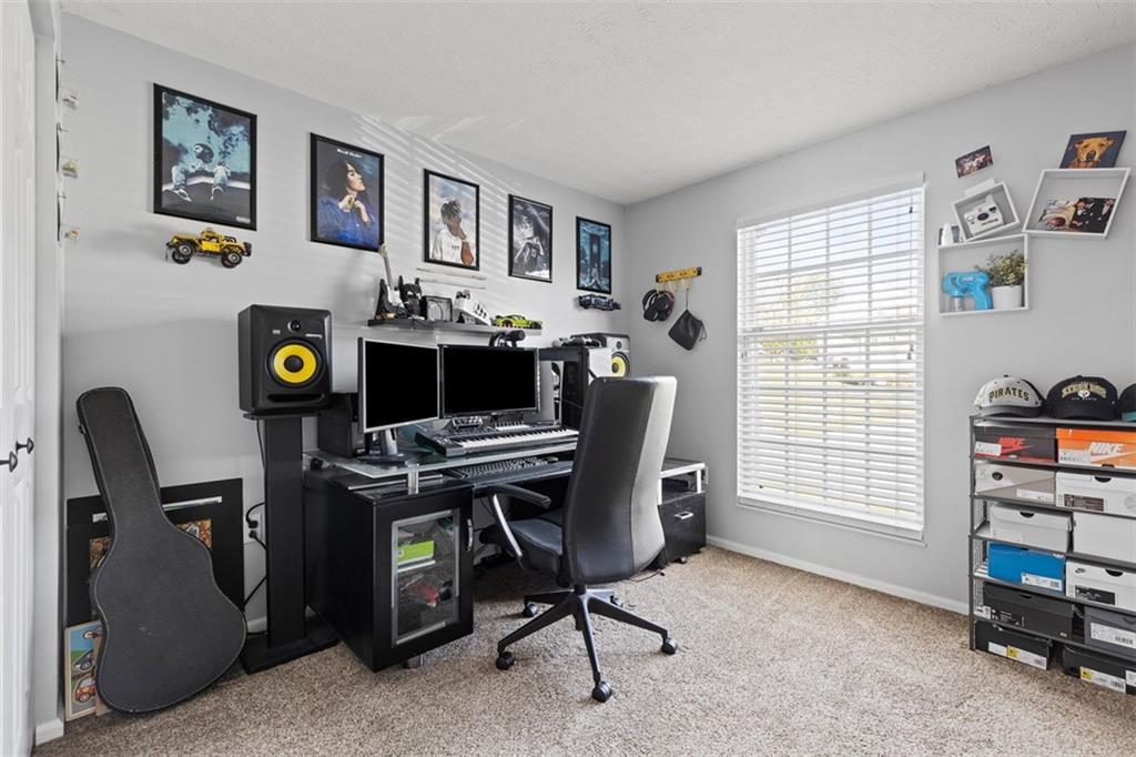 5079 Windriver Drive McKees Rocks, PA 15136 - Photo 24 of 50 a view of a workspace with furniture and a window