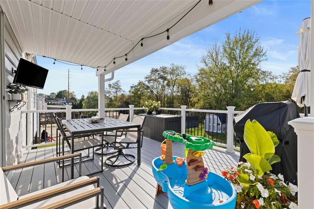 5079 Windriver Drive McKees Rocks, PA 15136 - Photo 36 of 50 a view of a chairs and table in patio