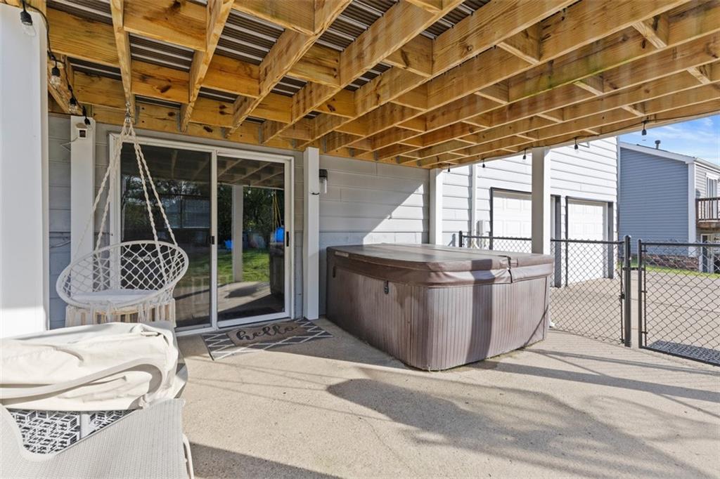 5079 Windriver Drive McKees Rocks, PA 15136 - Photo 39 of 50 a view of a patio with a couch and wooden fence