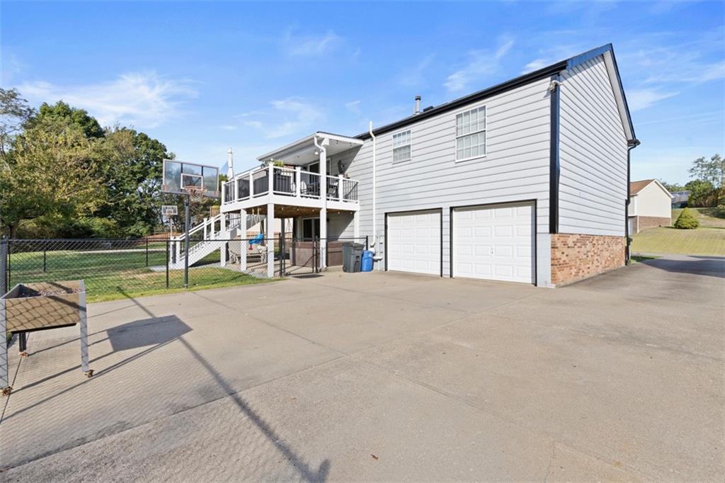 5079 Windriver Drive McKees Rocks, PA 15136 - Photo 41 of 50 a view of a house with backyard and sitting area