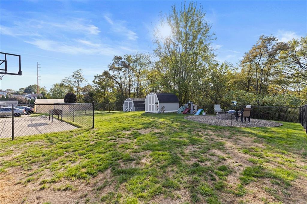 5079 Windriver Drive McKees Rocks, PA 15136 - Photo 44 of 50 a swimming pool with lots of tress in front of it