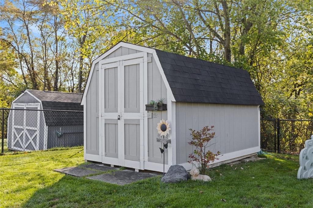 5079 Windriver Drive McKees Rocks, PA 15136 - Photo 45 of 50 a backyard of a house with table and chairs