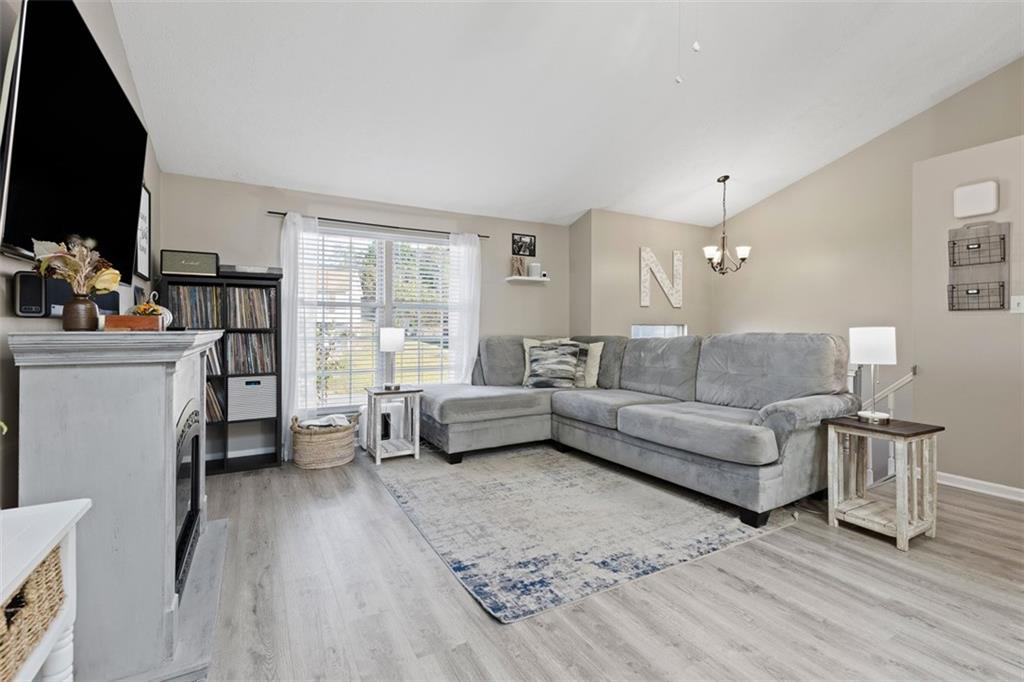 5079 Windriver Drive McKees Rocks, PA 15136 - Photo 7 of 50 a living room with furniture and a flat screen tv