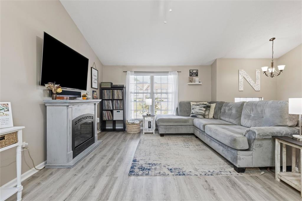 5079 Windriver Drive McKees Rocks, PA 15136 - Photo 8 of 50 a living room with furniture and a flat screen tv