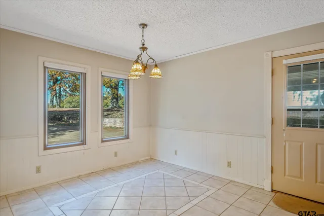 a view of an empty room with window
