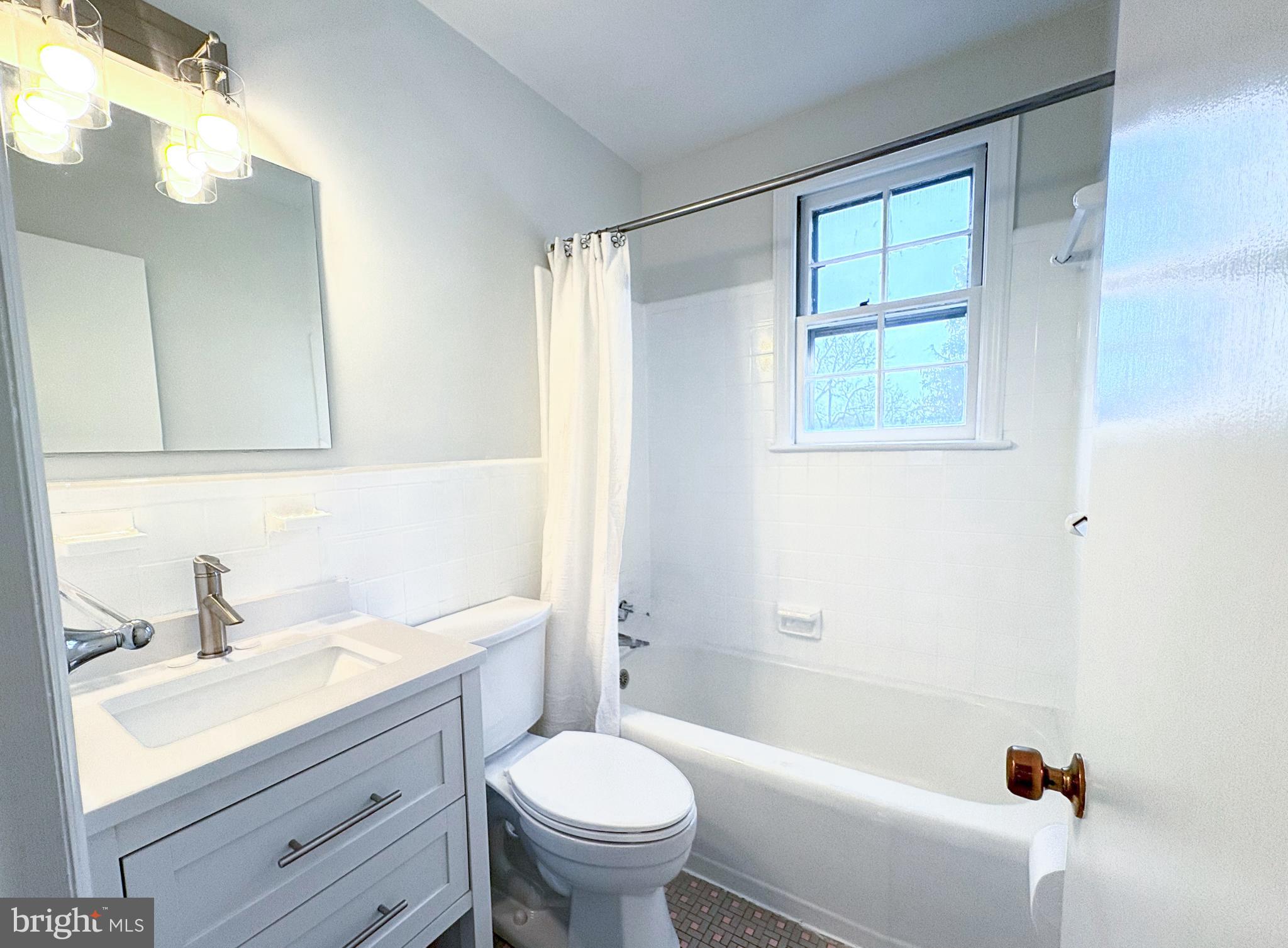 4505 Hargrove Road Temple Hills, MD 20748 - Photo 22 of 39 Bright and modern bathroom oasis.