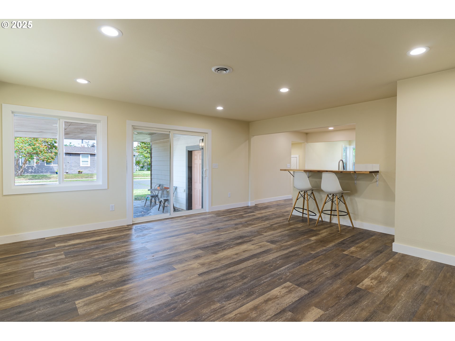 1895 Balm Street Baker City, OR 97814 - Photo 14 of 32 a view of an empty room with wooden floor