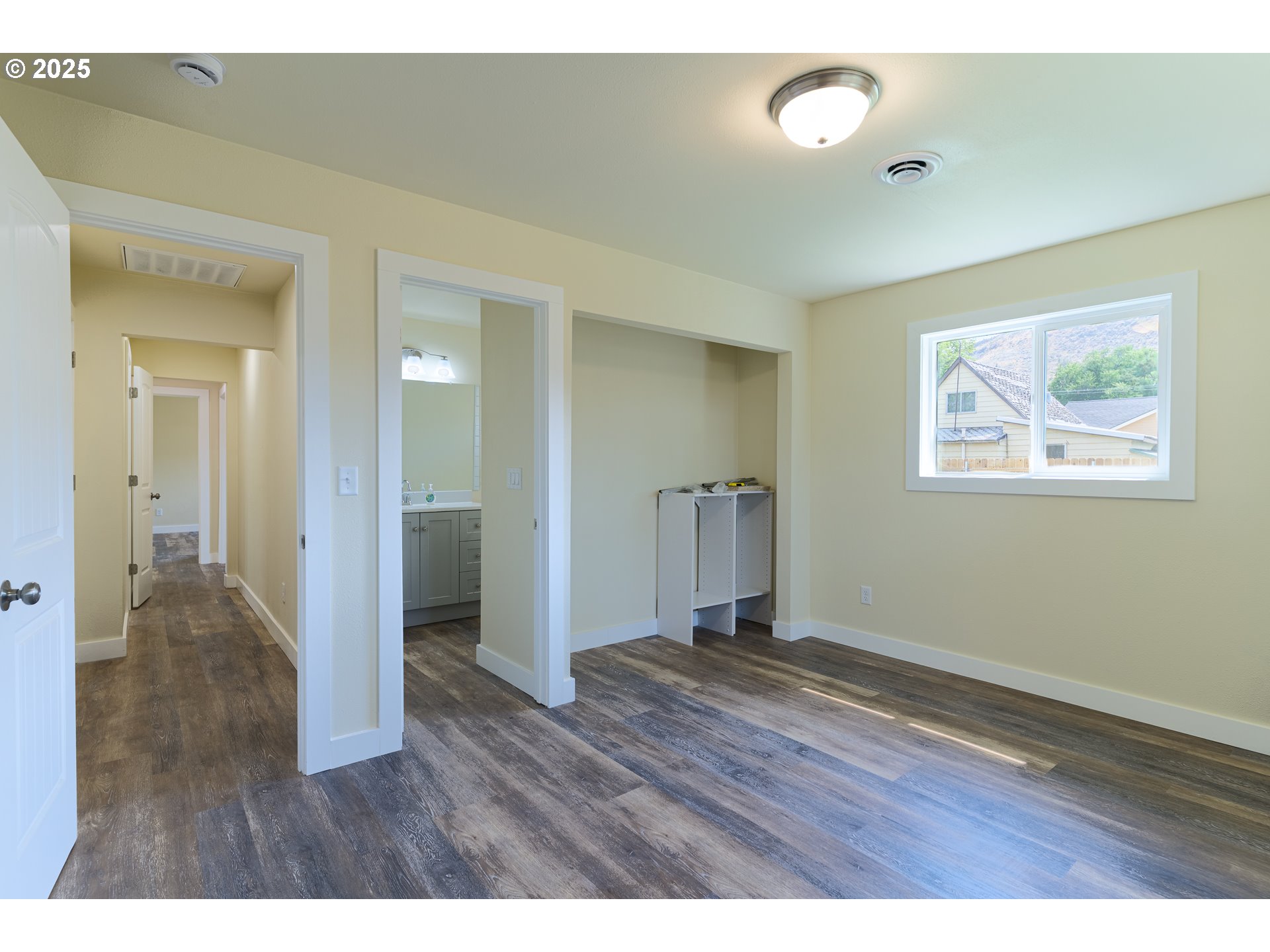 1895 Balm Street Baker City, OR 97814 - Photo 16 of 32 a view of an empty room and wooden floor