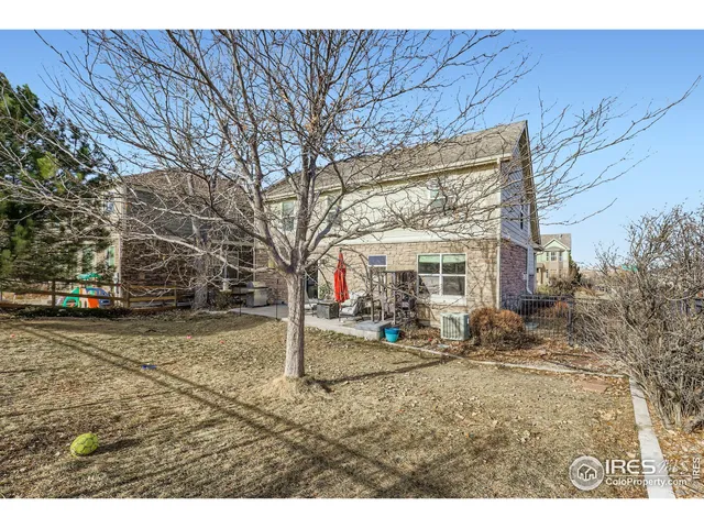 a view of a house with a sink and yard