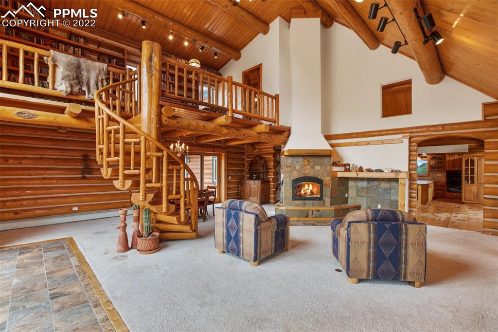 3311 County Road 103 Florence, CO 81226 - Photo 15 of 50 a view of a patio with table and chairs and a barbeque