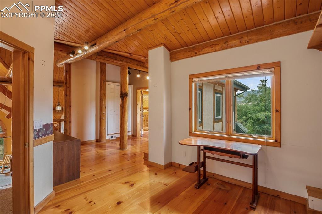 3311 County Road 103 Florence, CO 81226 - Photo 27 of 50 a view of a room with wooden floor and a window