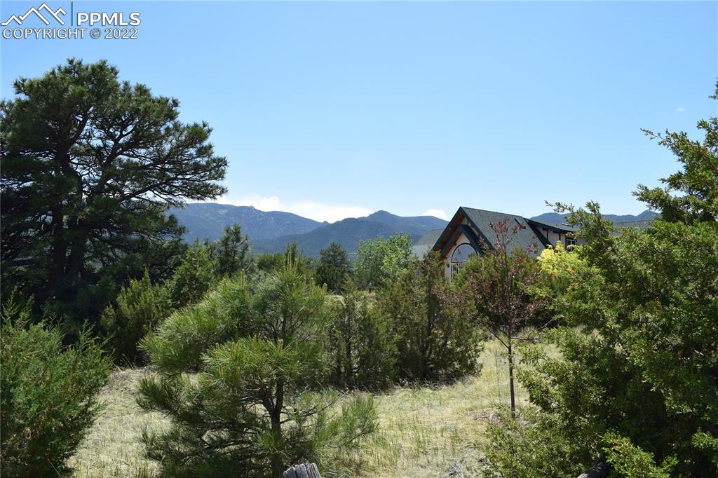 3311 County Road 103 Florence, CO 81226 - Photo 43 of 50 a view of a house with a mountain in the background