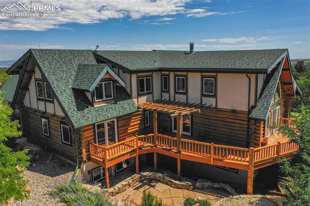 3311 County Road 103 Florence, CO 81226 - Photo 6 of 50 a front view of a house with balcony