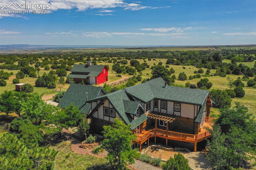 3311 County Road 103 Florence, CO 81226 - Photo 8 of 50 an aerial view of a house with a garden