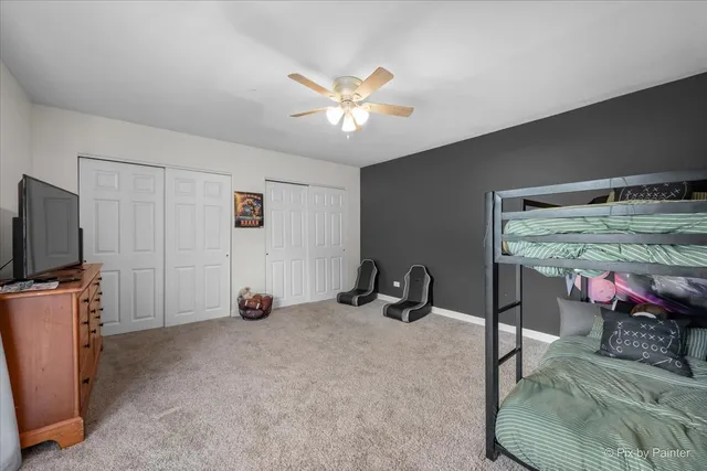 a view of a livingroom with furniture and a flat screen tv