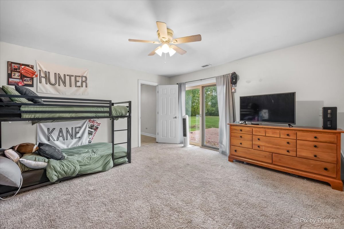 9520 Stacy Lane Union, IL 60180 - Photo 17 of 45 a living room with furniture and a flat screen tv