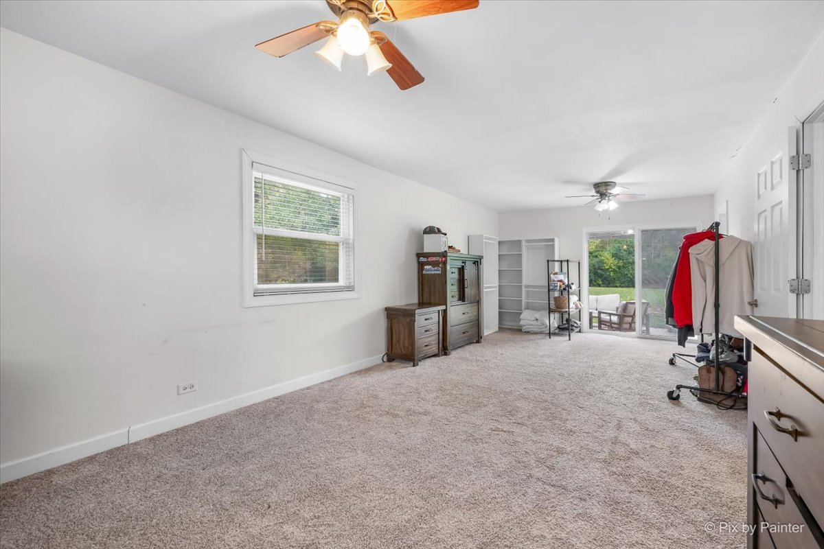 9520 Stacy Lane Union, IL 60180 - Photo 19 of 45 a view of a livingroom with a ceiling fan