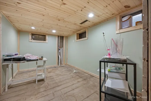 a room with furniture and wooden floor