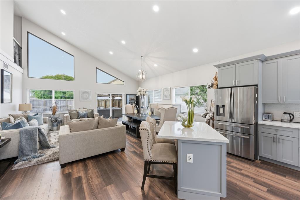23367 Boca Trace Drive Boca Raton, FL 33433 - Photo 5 of 34 a kitchen with a refrigerator and a white cabinets