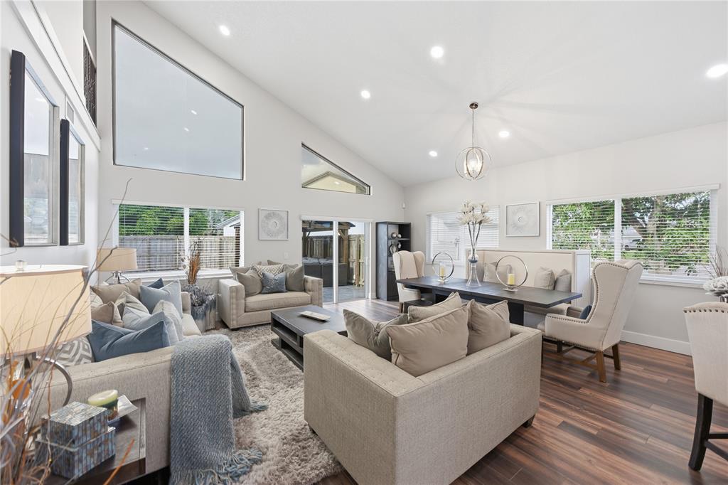 23367 Boca Trace Drive Boca Raton, FL 33433 - Photo 6 of 34 a living room with furniture and a large window