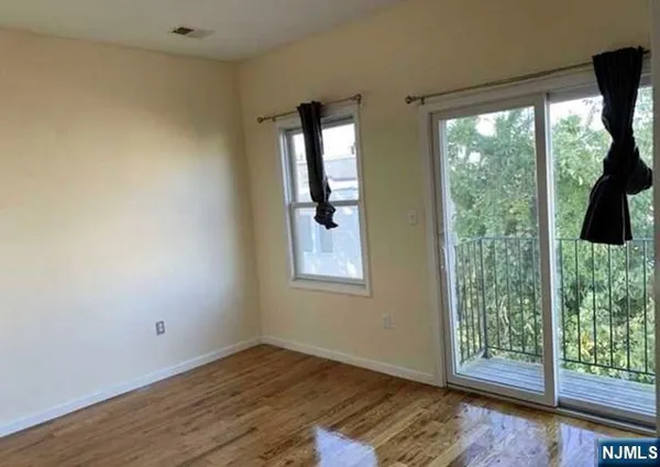 a view of small space with wooden floor