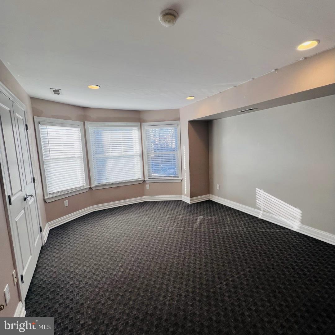 619 South 42nd Street Philadelphia, PA 19104 - Photo 11 of 25 a view of an empty room with a window