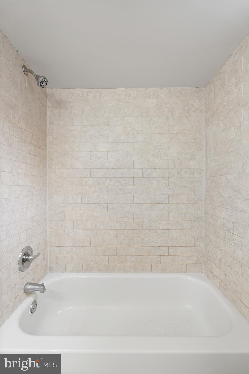 619 South 42nd Street Philadelphia, PA 19104 - Photo 19 of 30 a bathroom with a bathtub and a shower