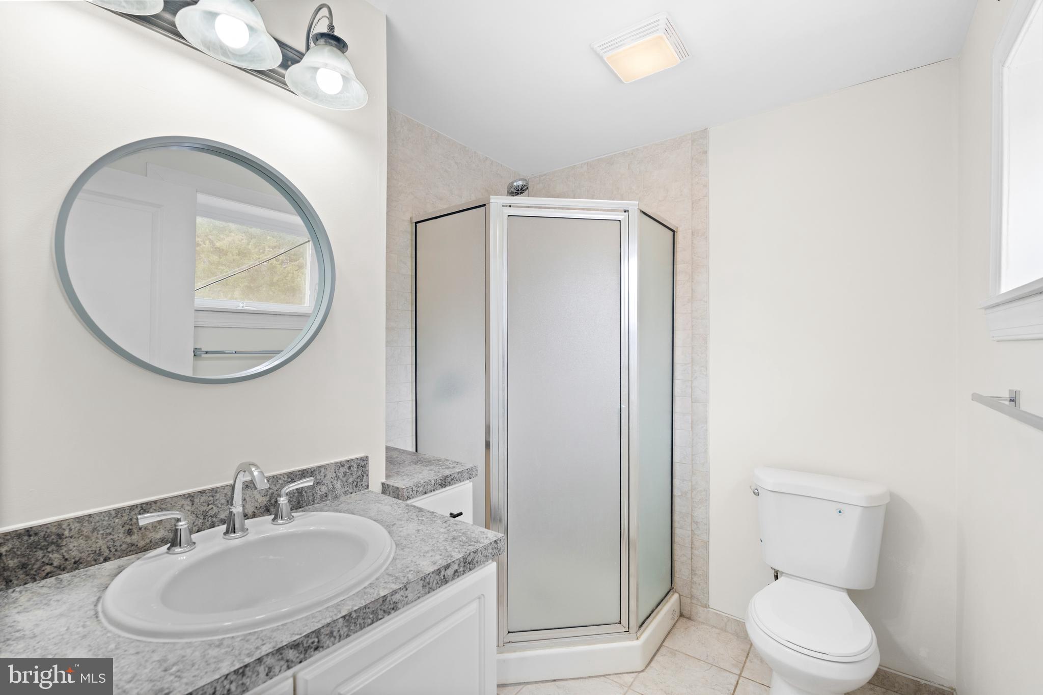 619 South 42nd Street Philadelphia, PA 19104 - Photo 25 of 30 a bathroom with a sink and a mirror