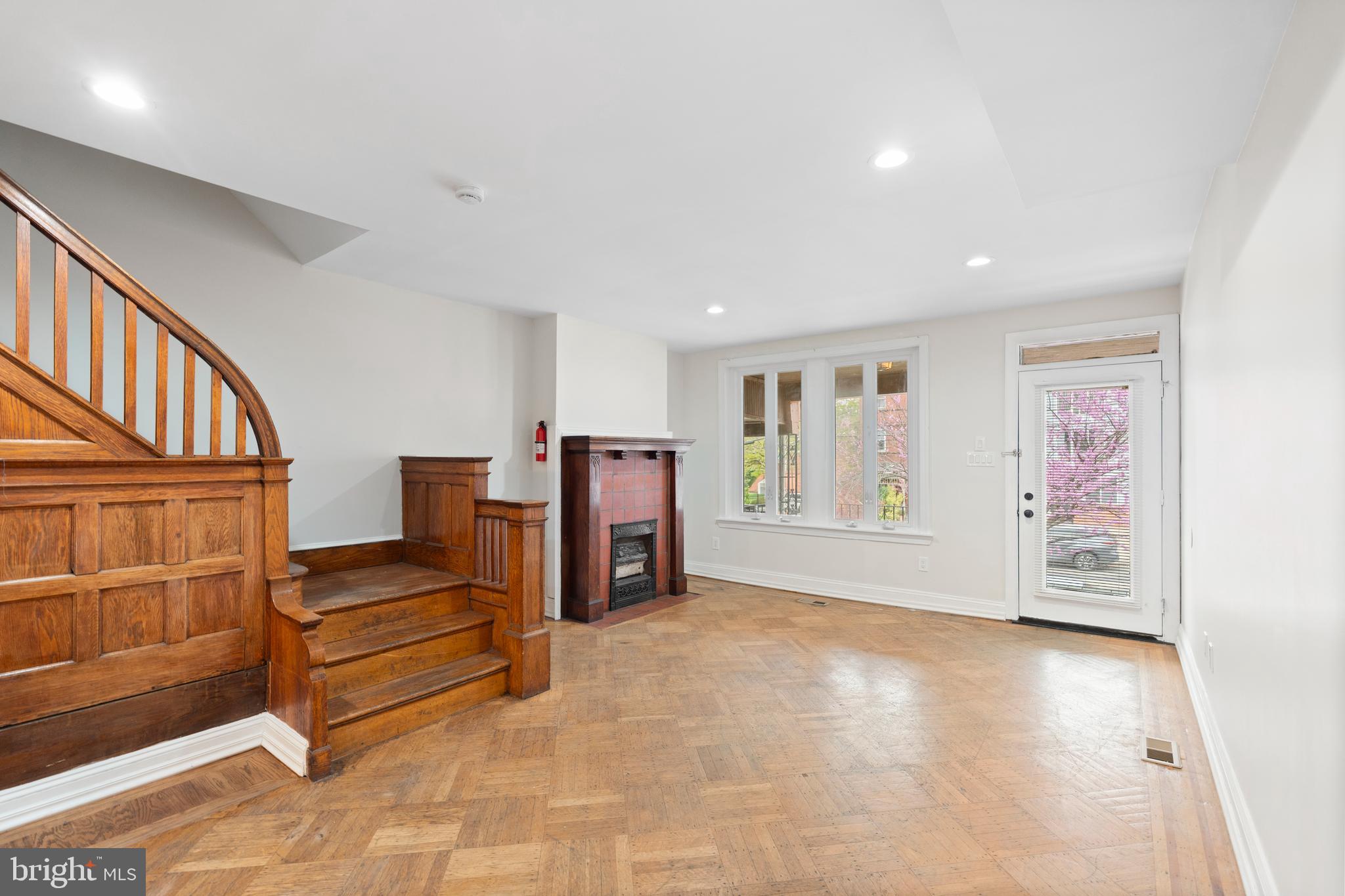 619 South 42nd Street Philadelphia, PA 19104 - Photo 3 of 30 a view of an empty room with stairs and furniture