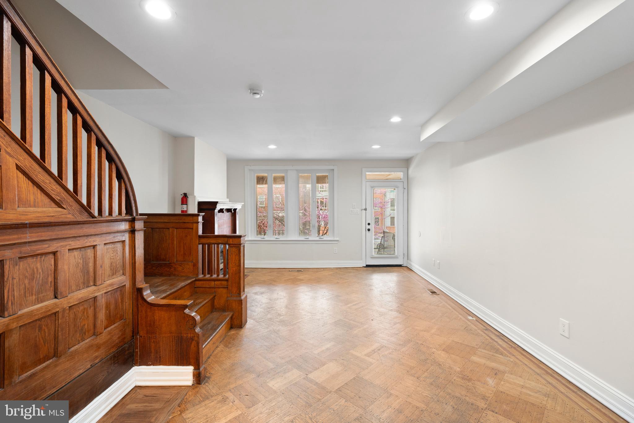 619 South 42nd Street Philadelphia, PA 19104 - Photo 7 of 30 a view of an empty room with wooden floor