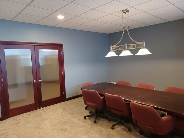 a workspace with a chandelier