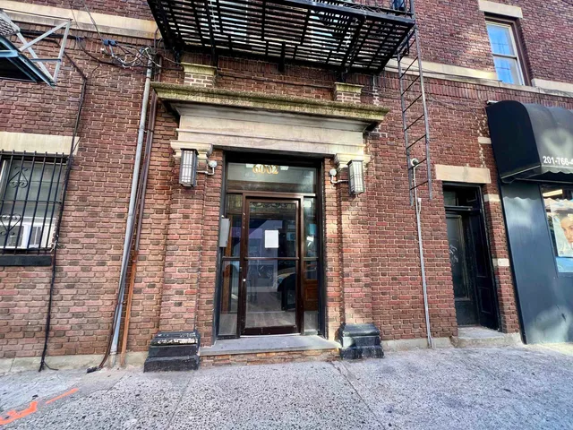 a front view of a building with glass door