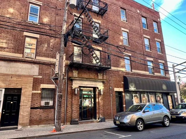 a car parked in front of a building