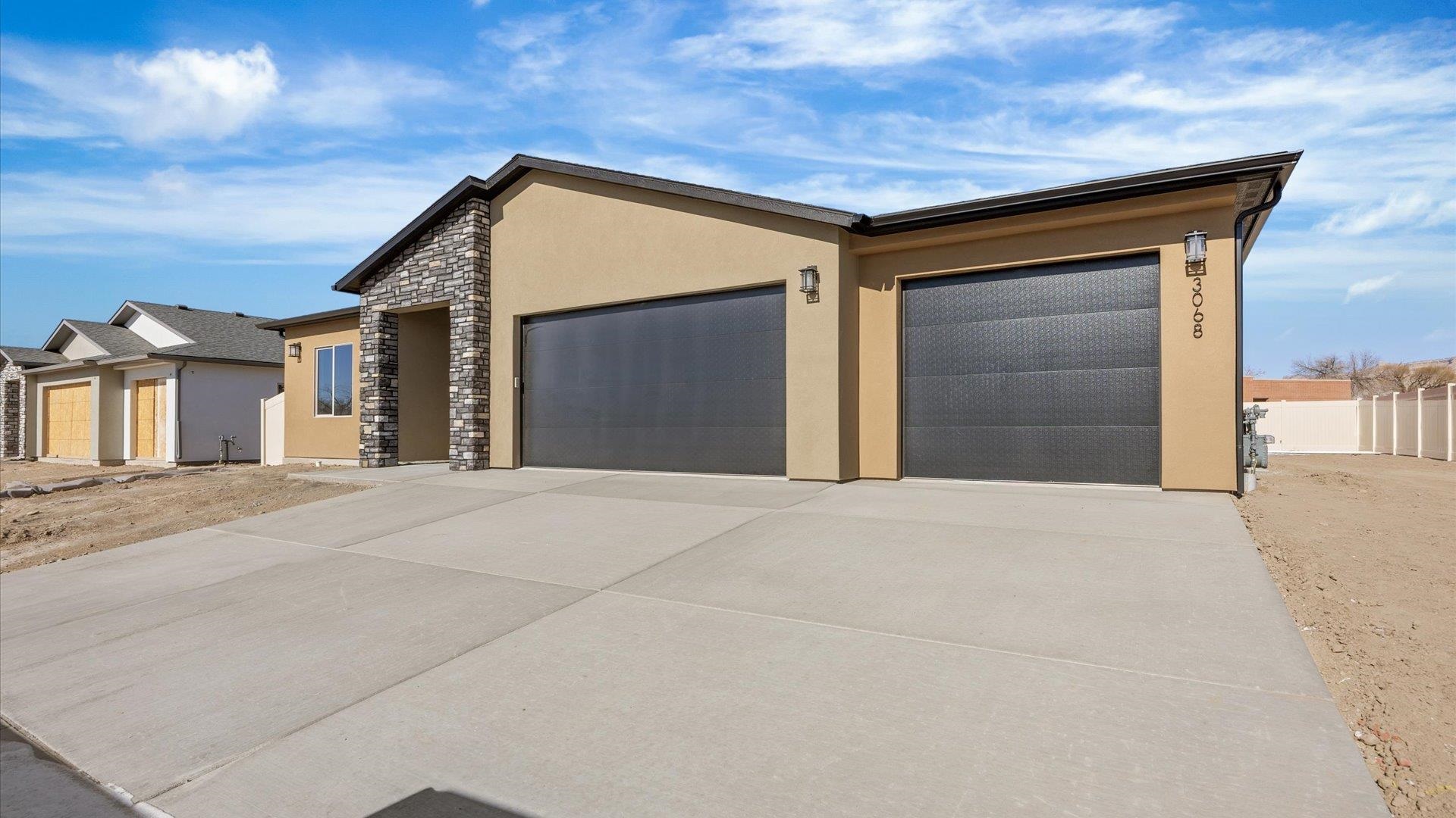 3068 Thunderhead Way Grand Junction, CO 81504 - Photo 5 of 7 a house with a outdoor space