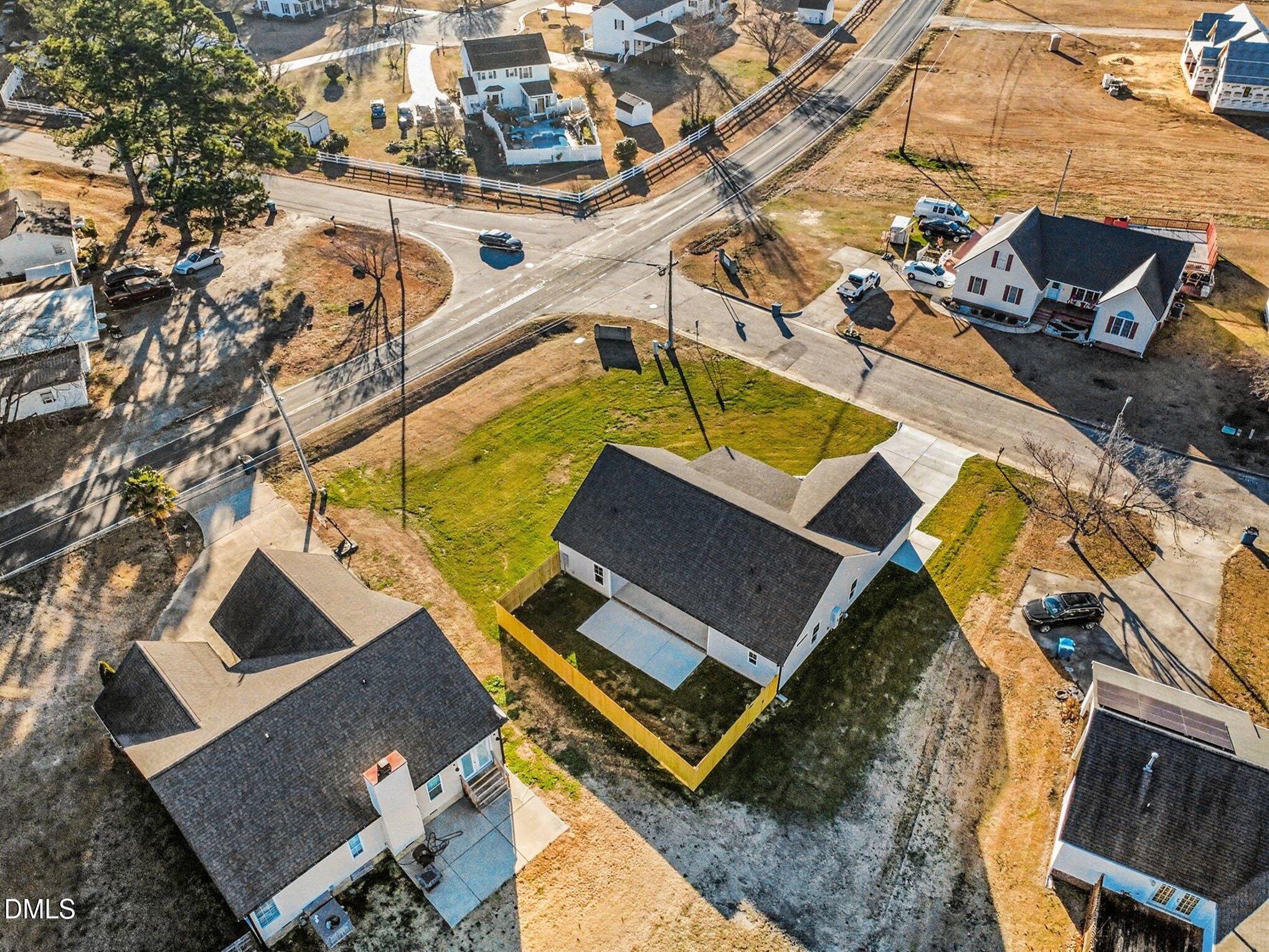 100 Covington Lane Dunn, NC 28334 - Photo 5 of 61 an aerial view of a house with a swimming pool